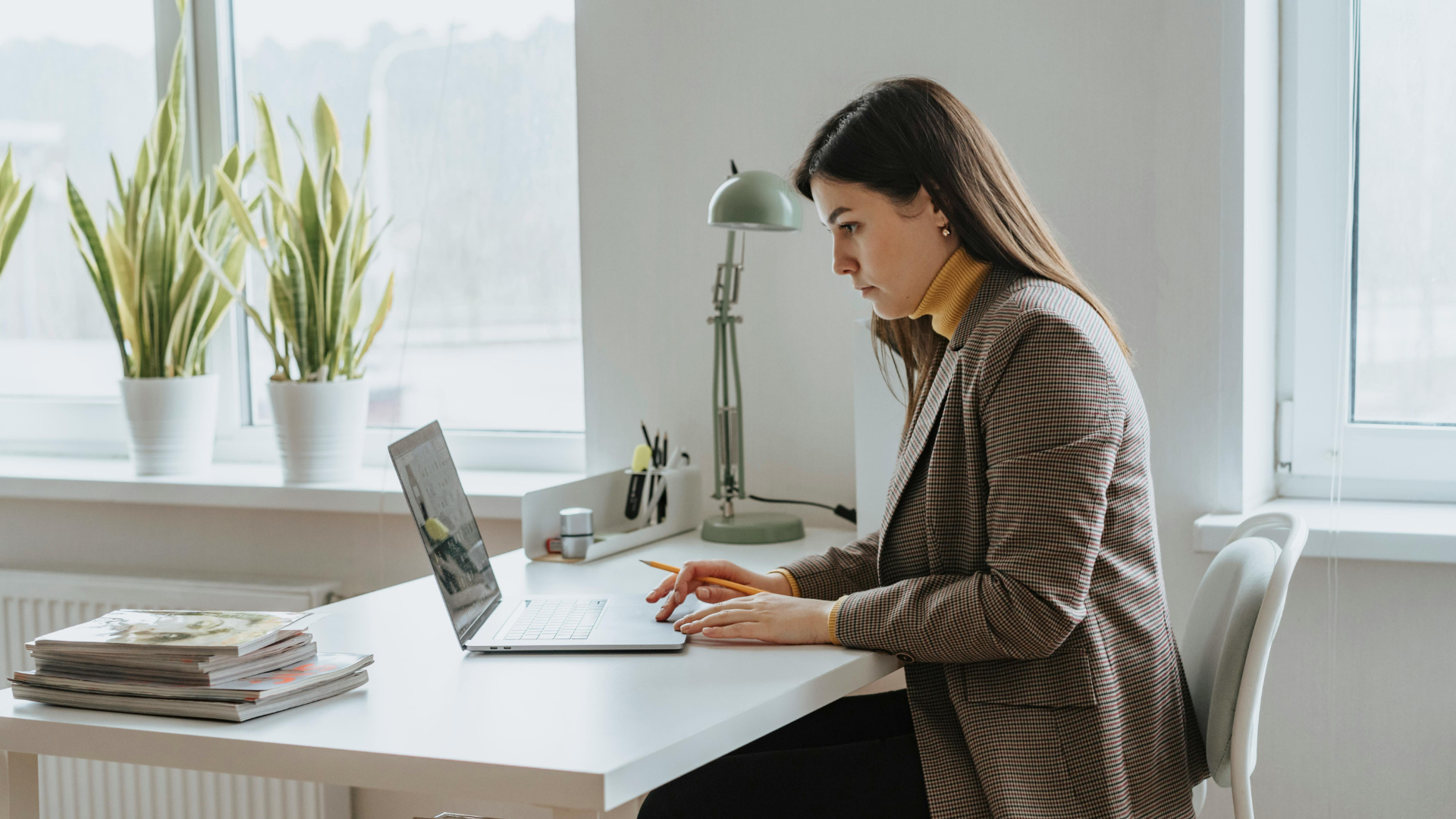 Serious female struggling to write candidate email